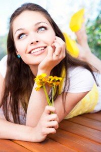 Smiling girl gets her cosmetic dentistry treatments from a dentist near Boerne, TX.